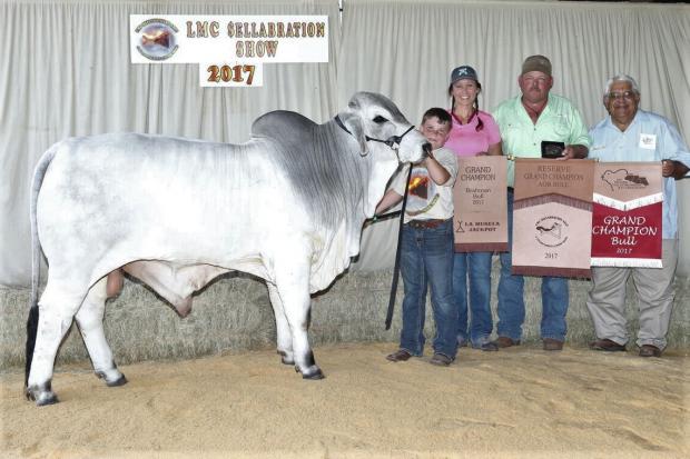 Cattle Ward with his champion LMC Polled Madison son LMC Polled Amigo.